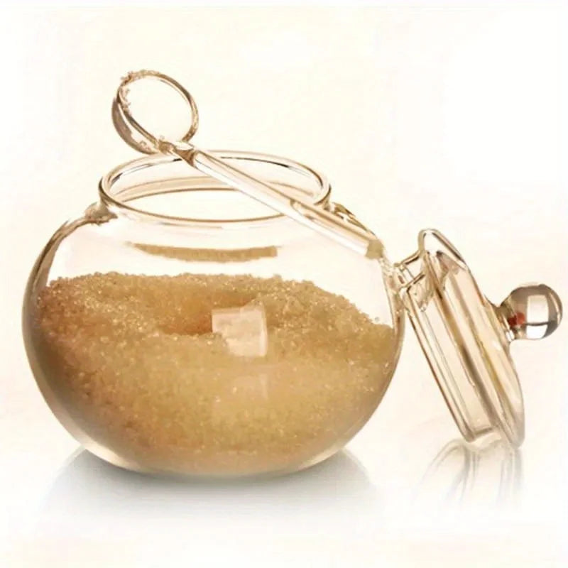 Pote de açúcar transparente de 300ml com tampa e colher doseadora.