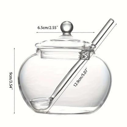 Pote de açúcar transparente de 300ml com tampa e colher doseadora.